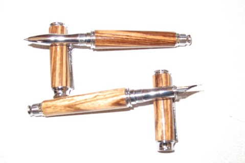 A pair of pens by Fred Taylor